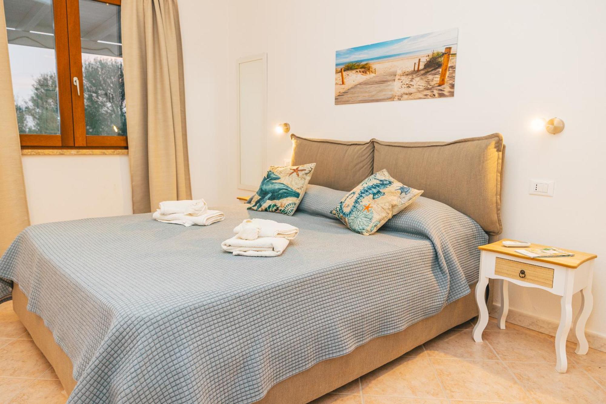 Case Vacanze Il Sogno 2 Porto Pino Pokoj fotografie