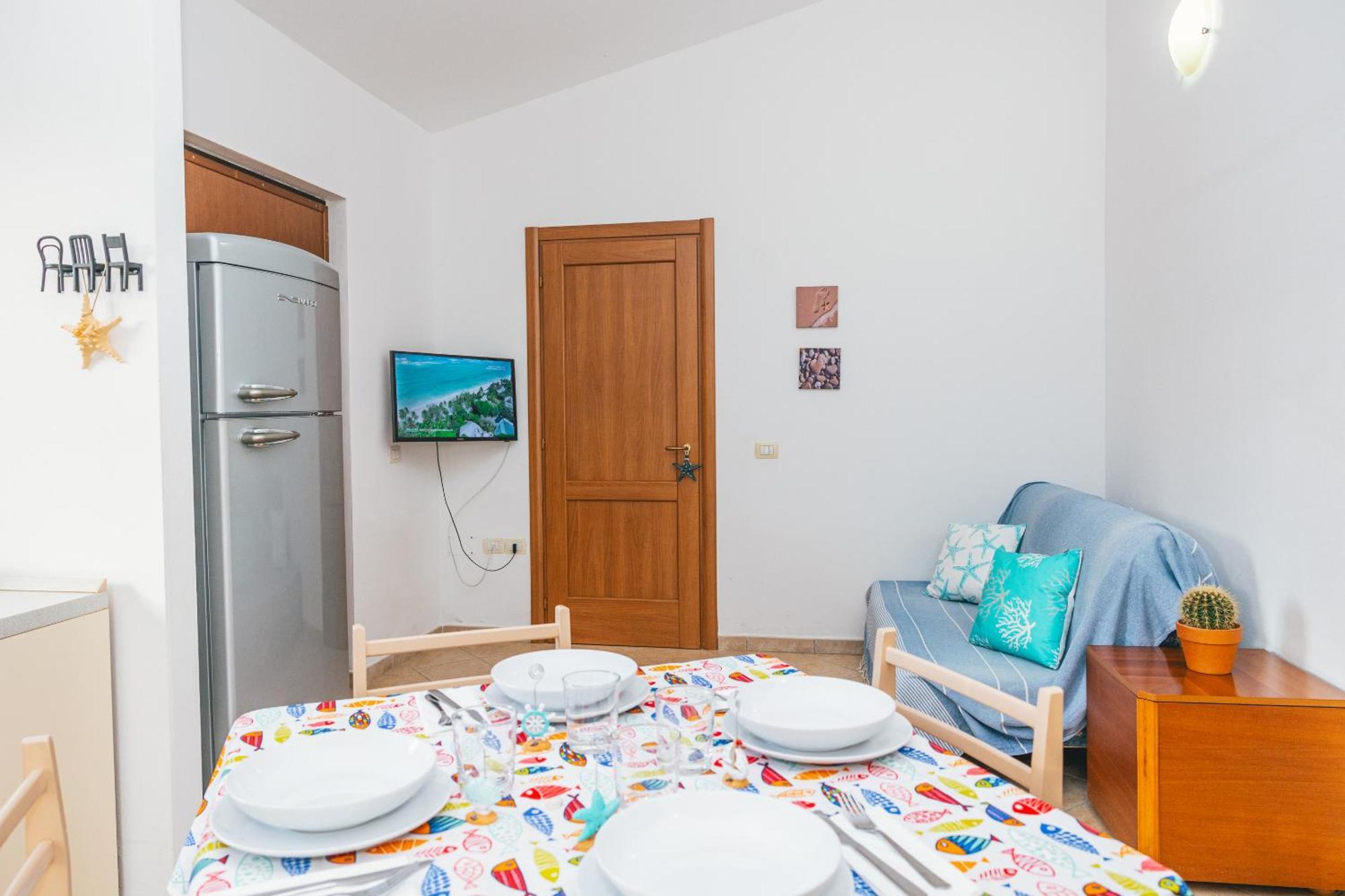 Case Vacanze Il Sogno 2 Porto Pino Pokoj fotografie